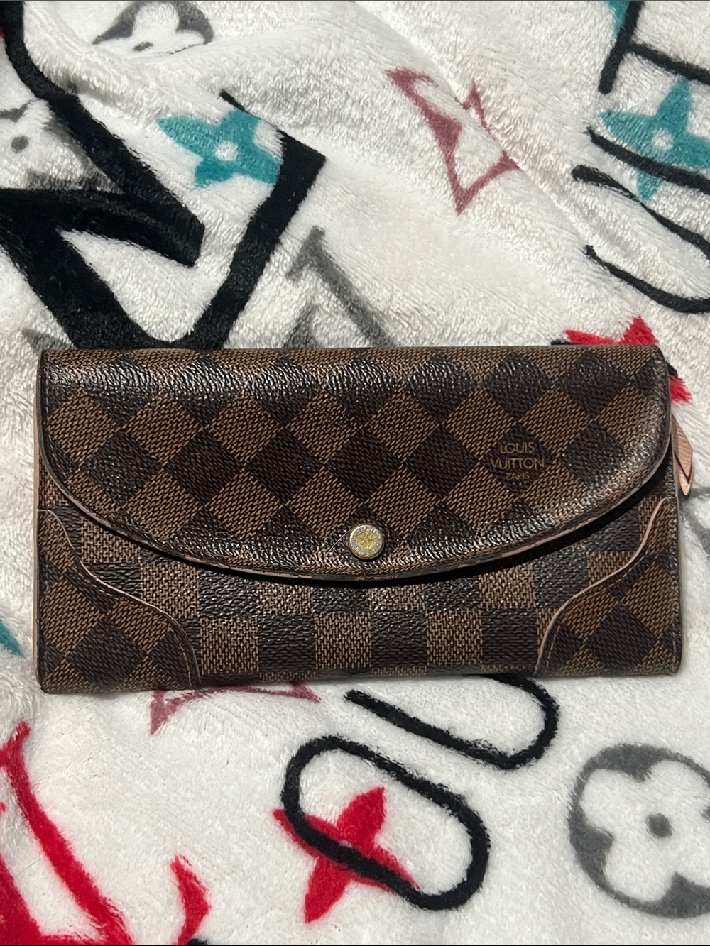 Louis Vuitton Damier Ebene Fold-Over Wallet in Brown